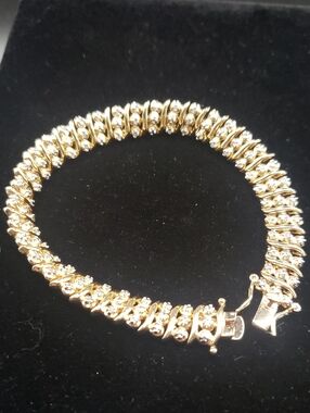 18K/Sterling Silver Swirl Design Diamond Design Tennis Bracelet